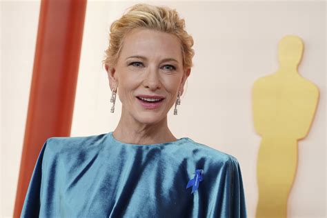 The meaning behind the blue ribbons worn at the Oscars